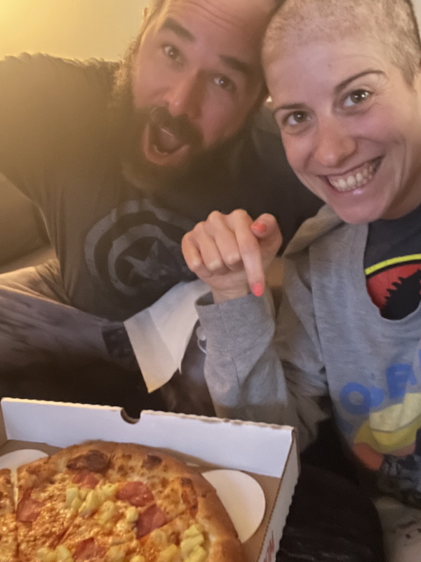 Anna T. and husband Joe with pizza