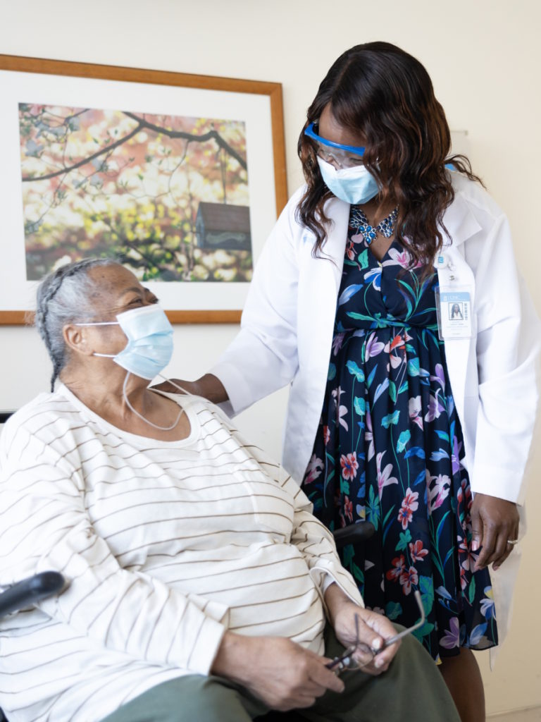 Dr. Shakira Grant with patient