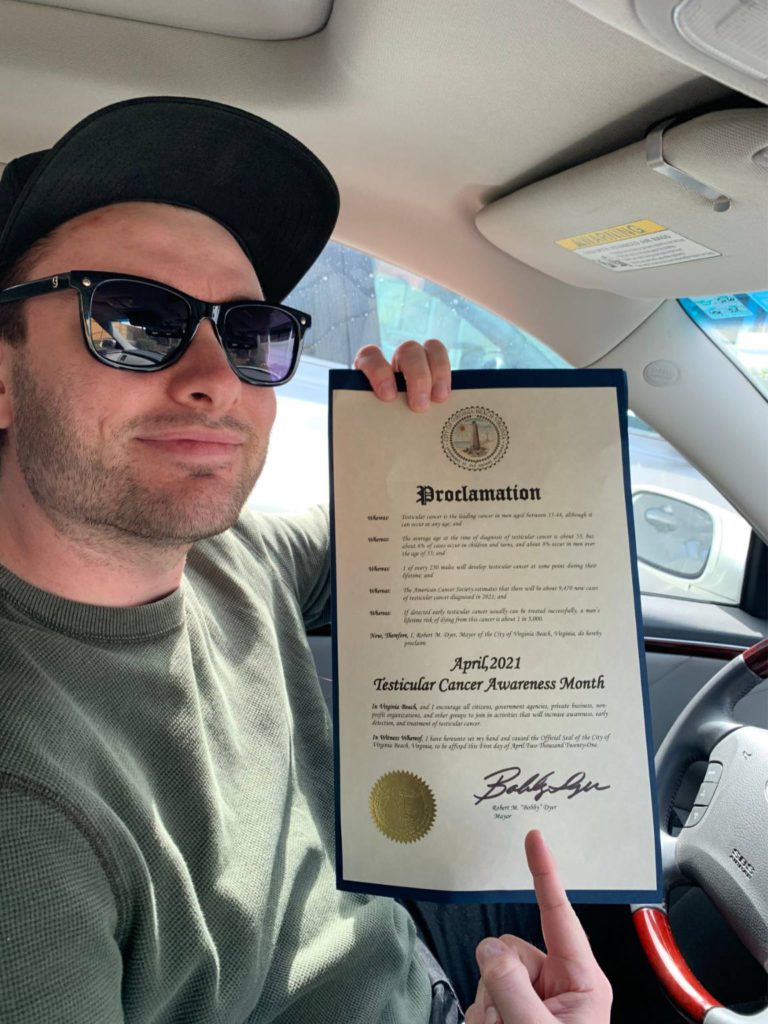 Steven C. holding a testicular cancer awareness certificate