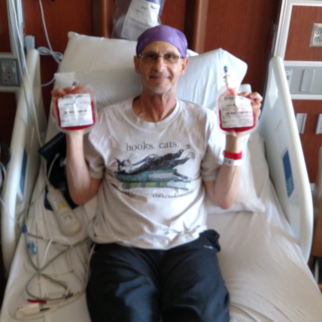 Steve holding his donor cord blood for stem cell transplant