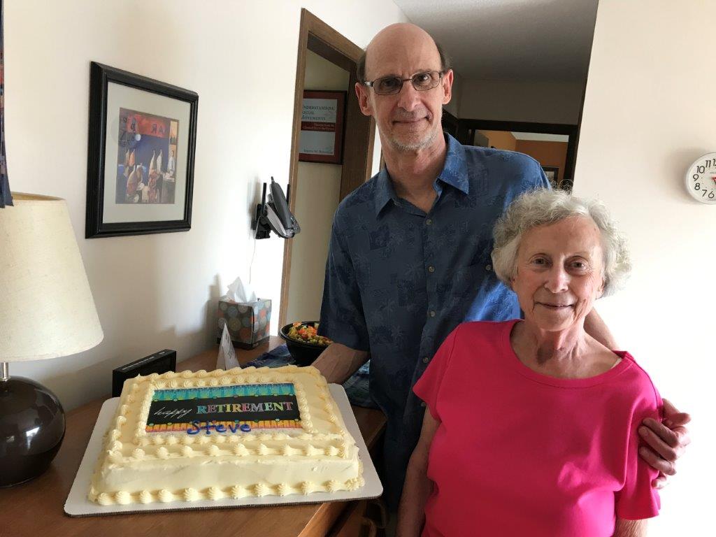 Steve celebrating his retirement with cake