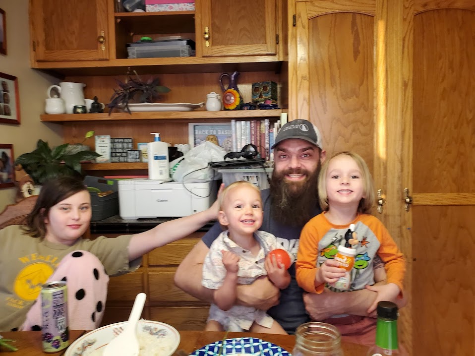 Jason is able to play with his kids with his colostomy bag
