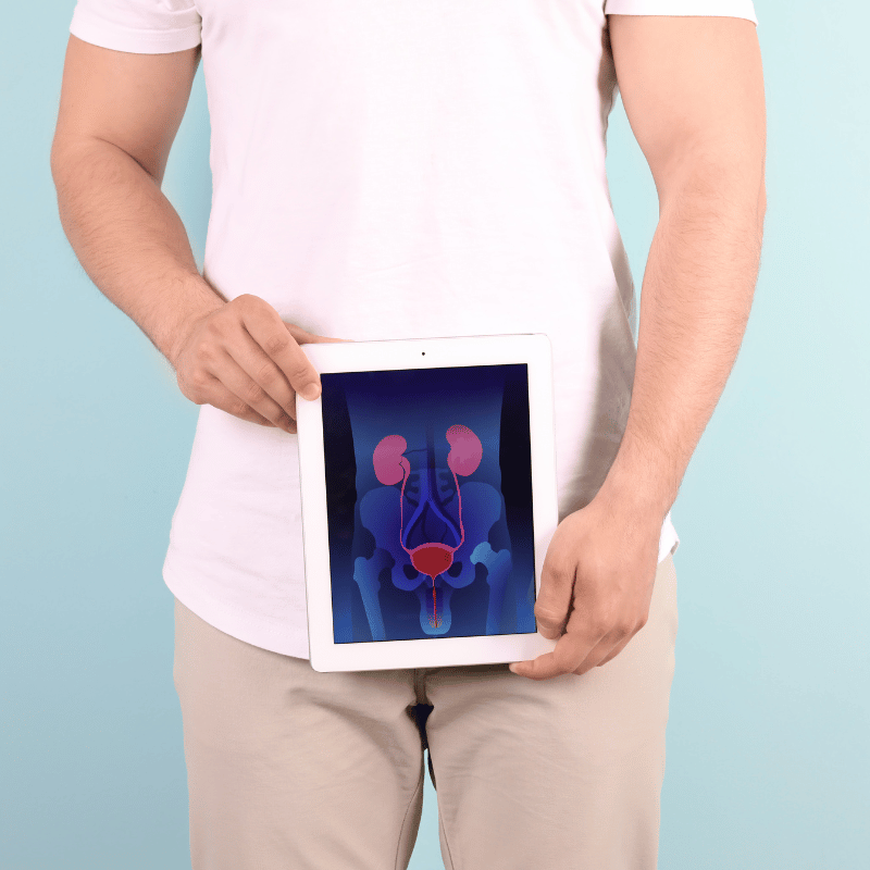 prostate cancer overview with a man holding an image of a prostate