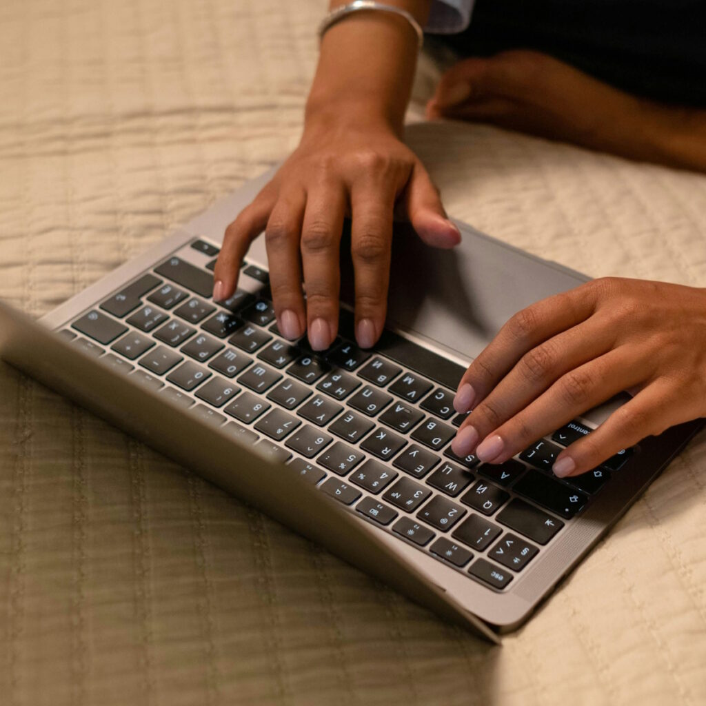 hands on laptop