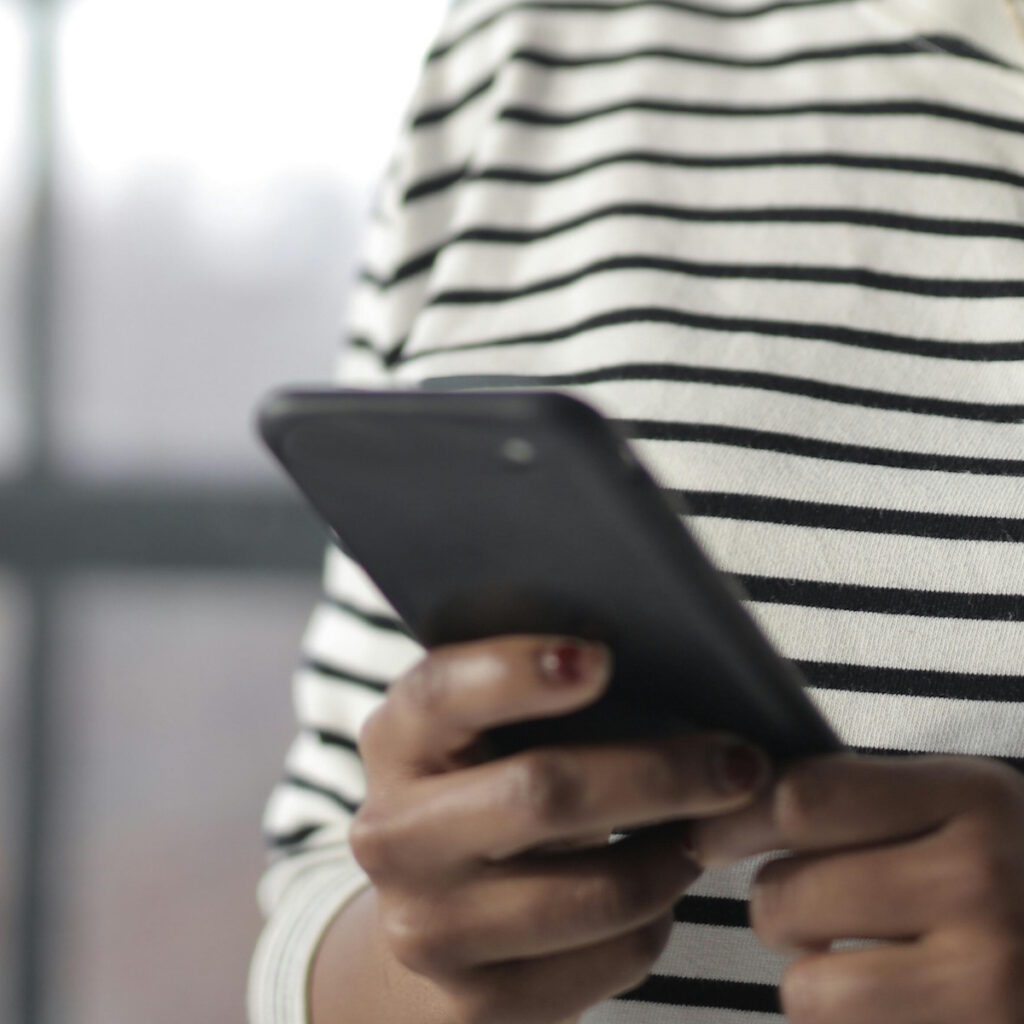 woman holding phone