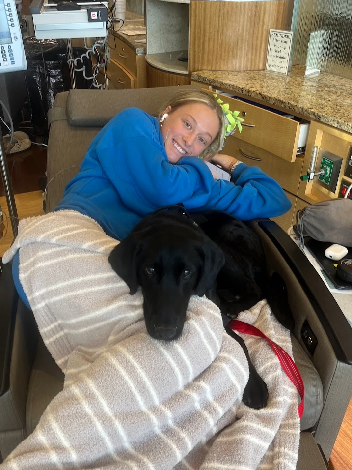Anni A. acute promyelocytic leukemia (APL) with her service dog Goose
